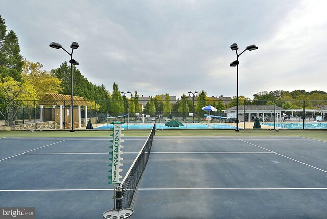 130 Chevy Chase St Unit 404, Gaithersburg, MD 20878 - view of tennis court featuring fence
