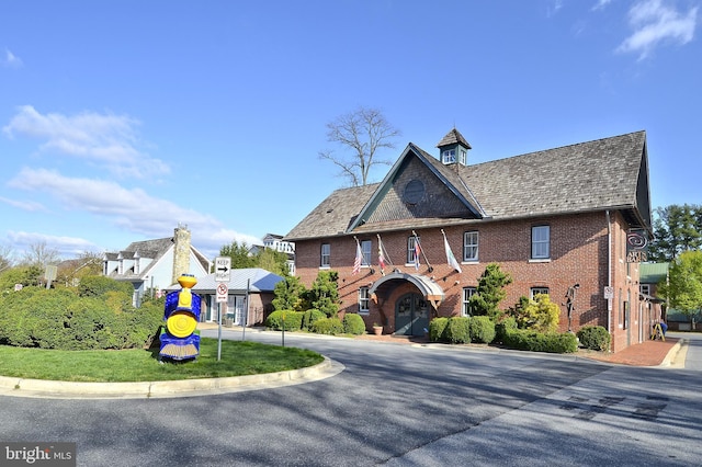 130 Chevy Chase St Unit 404, Gaithersburg, MD 20878 - tudor-style house with brick siding and a high end roof