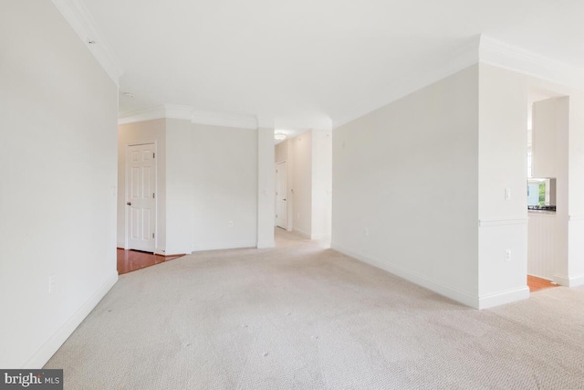 130 Chevy Chase St Unit 404, Gaithersburg, MD 20878 - spare room featuring light carpet, baseboards, and crown molding