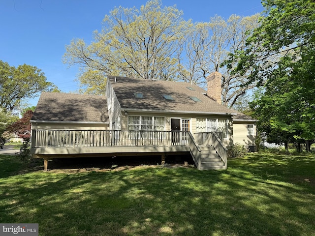 924 Hughes Dr, Hamilton, NJ 08690 - rear view of house with a shingled roof, a wooden deck, a chimney, and a yard