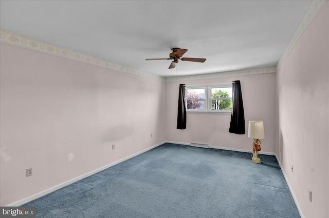 carpeted spare room featuring a ceiling fan, baseboards, and visible vents