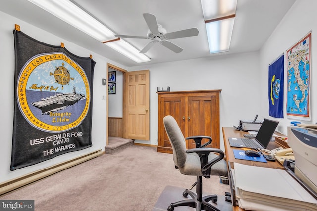 office space featuring ceiling fan and carpet