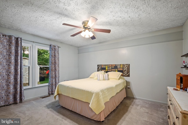 7815 Shallowbrook Ct, Severn, MD 21144 - bedroom with a textured ceiling, baseboards, ceiling fan, and carpet
