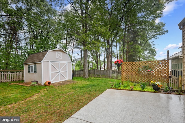 7815 Shallowbrook Ct, Severn, MD 21144 - view of yard with a storage unit, an outdoor structure, a fenced backyard, and a patio