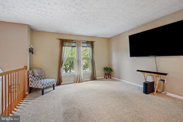 7815 Shallowbrook Ct, Severn, MD 21144 - sitting room with a textured ceiling, baseboards, and carpet floors