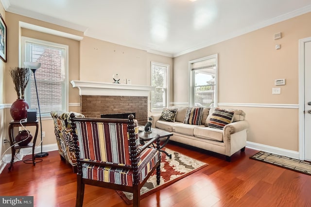 3717 Nortonia Rd, Baltimore, MD 21216 - living area featuring ornamental molding, wood finished floors, baseboards, and a fireplace