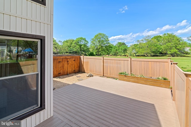 deck featuring a fenced backyard