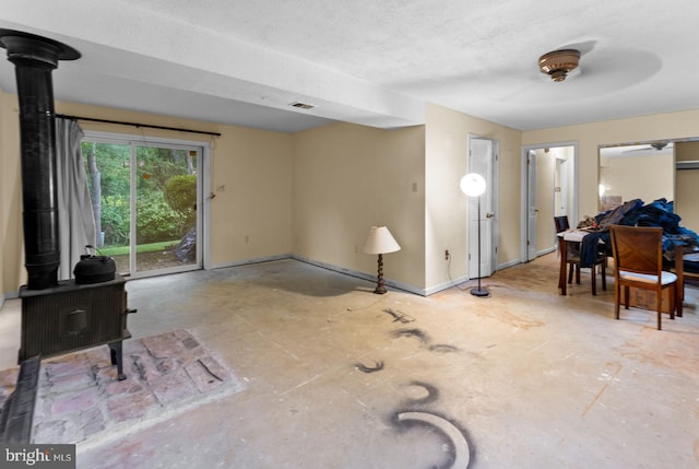 1806 Cranberry Ln, Reston, VA 20191 - living area with a wood stove and concrete floors