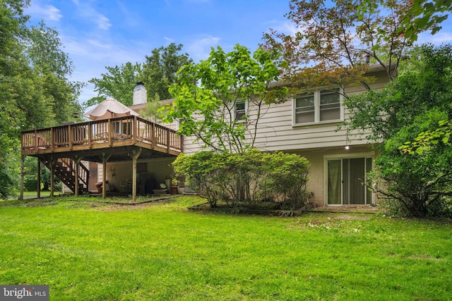 1806 Cranberry Ln, Reston, VA 20191 - back of house featuring a deck, a lawn, stairway, and brick siding
