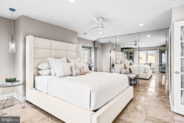bedroom with recessed lighting, baseboards, and marble finish floor