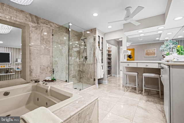 full bath featuring vanity, recessed lighting, a ceiling fan, a tub with jets, and a stall shower