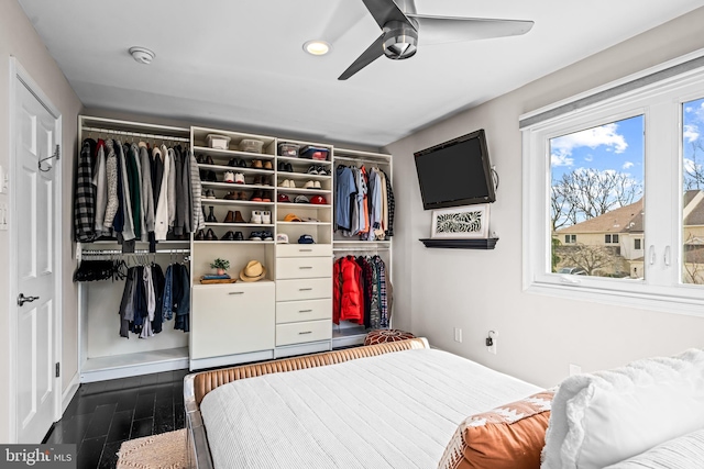 bedroom with recessed lighting, a ceiling fan, dark wood-style floors, and multiple windows