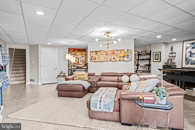 living area featuring recessed lighting, visible vents, and stairway