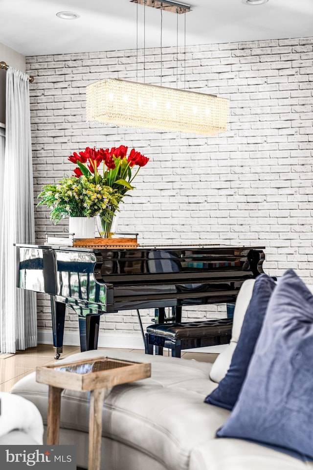 living room with brick wall