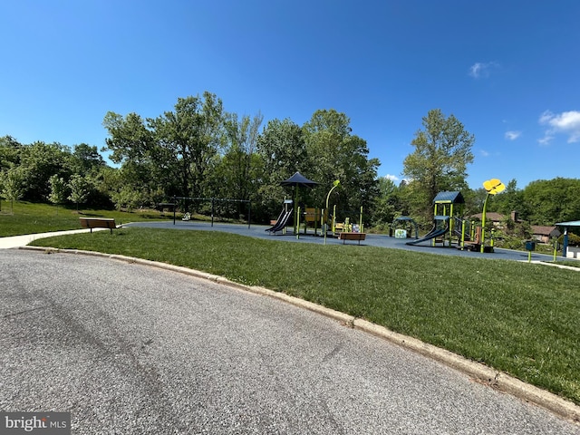 community play area with a yard