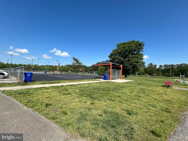 view of home's community with a lawn