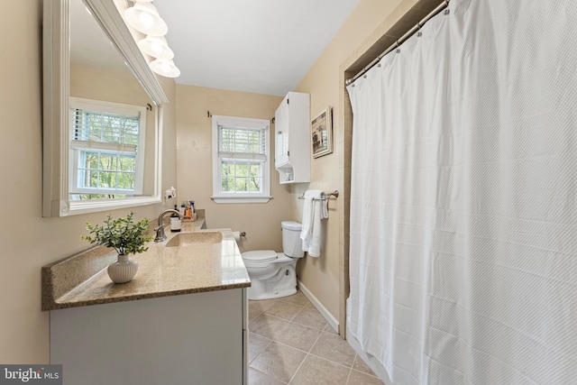 bathroom featuring toilet, tile patterned floors, curtained shower, and vanity