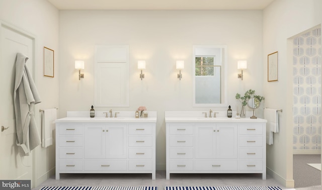 bathroom with a sink, baseboards, and two vanities