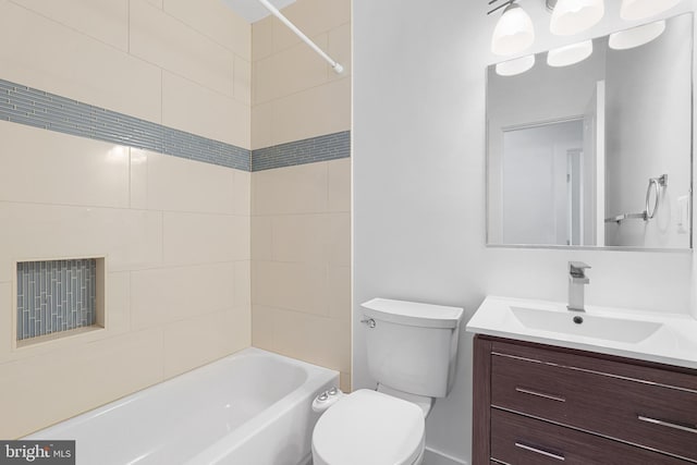 full bathroom with vanity, bathtub / shower combination, and toilet
