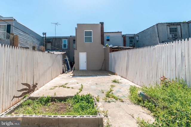 view of yard featuring a fenced backyard and a deck
