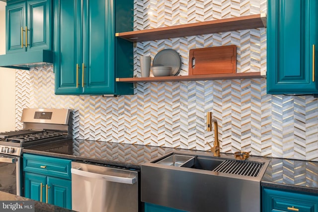 kitchen featuring dark countertops, open shelves, a sink, stainless steel appliances, and backsplash