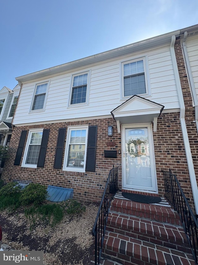 multi unit property with brick siding