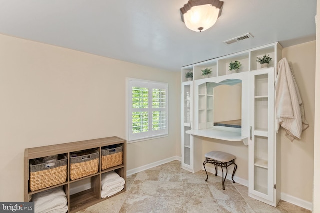 mudroom with baseboards and visible vents