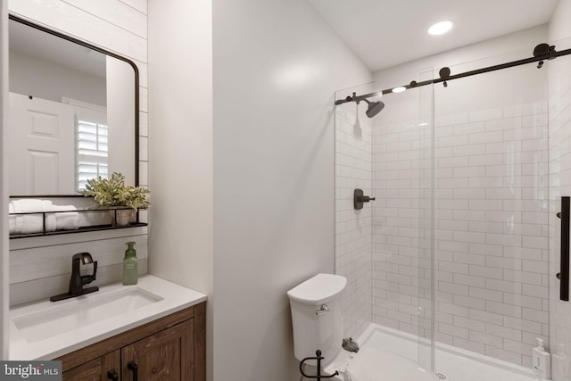 bathroom with decorative backsplash, a stall shower, vanity, toilet, and recessed lighting