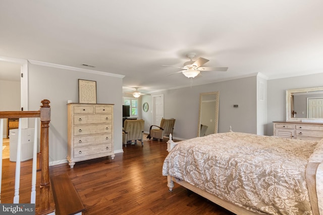 bedroom with baseboards, ornamental molding, dark wood finished floors, and visible vents