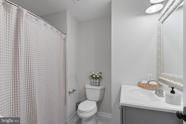 bathroom featuring vanity, tile patterned flooring, visible vents, and toilet