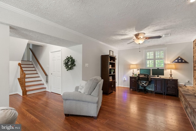office area with visible vents, ornamental molding, wood finished floors, a textured ceiling, and a ceiling fan