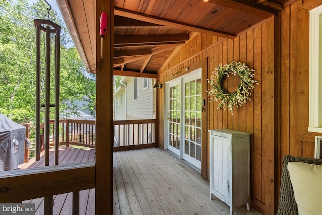 wooden terrace featuring french doors