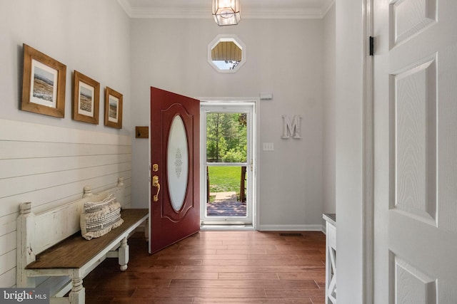 16 Tolson Ln, Stafford, VA 22556 - foyer featuring dark wood-type flooring, ornamental molding, baseboards, and visible vents