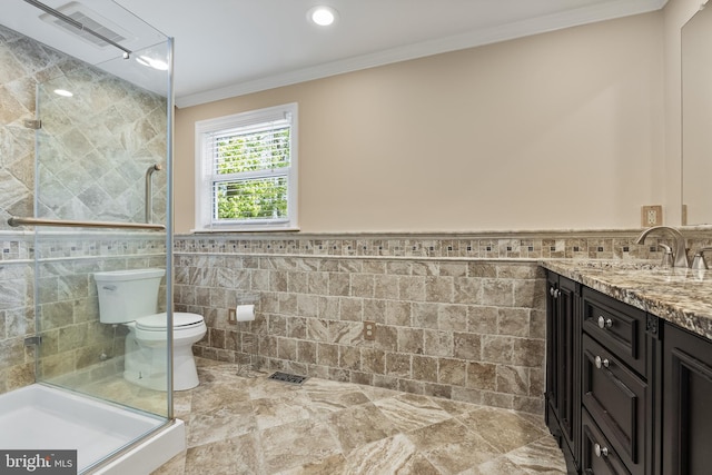 bathroom featuring ornamental molding, a stall shower, toilet, and tile walls