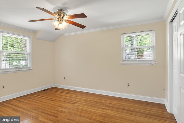 unfurnished bedroom featuring a closet, light wood finished floors, and baseboards