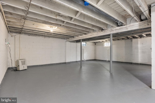 below grade area with concrete block wall