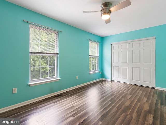 34 Dovetree Dr, Newark, DE 19713 - unfurnished bedroom with wood finished floors, a closet, baseboards, and a ceiling fan