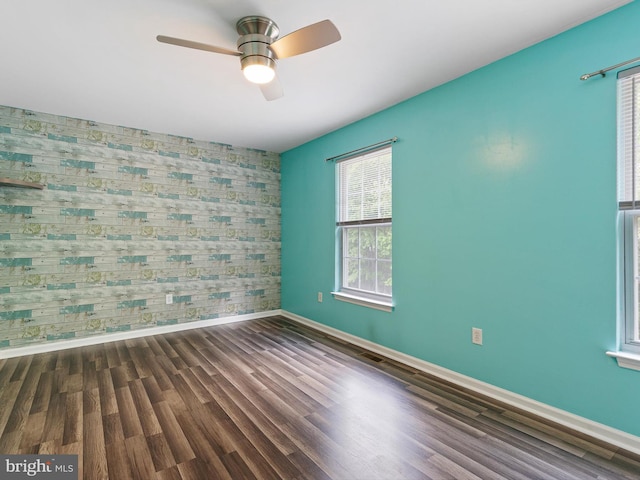 34 Dovetree Dr, Newark, DE 19713 - empty room featuring baseboards, wood finished floors, ceiling fan, and an accent wall