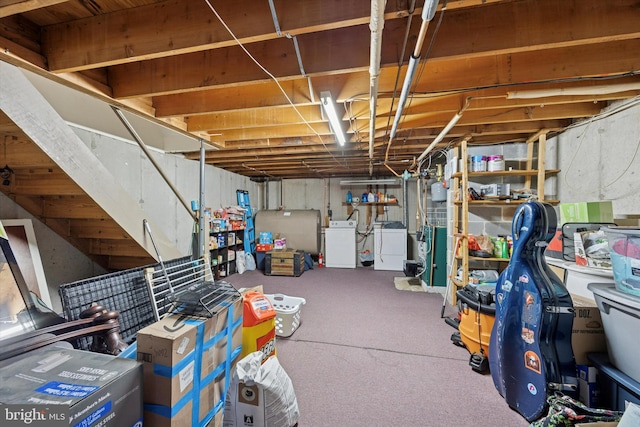 unfinished below grade area with separate washer and dryer and carpet