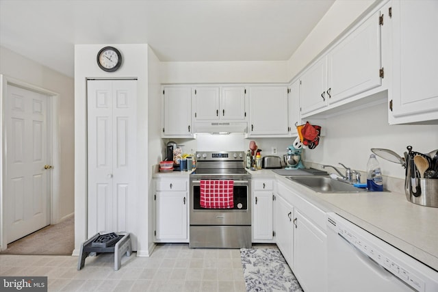 kitchen with white dishwasher, stainless steel electric range, under cabinet range hood, white cabinets, and a sink