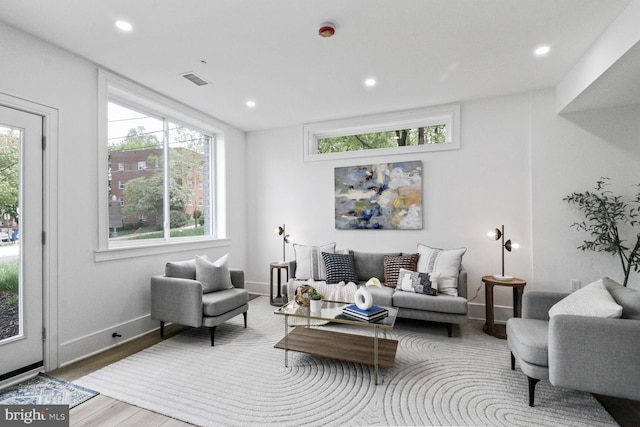 2524 41st St NW Unit 1, Washington, DC 20007 - living room featuring recessed lighting, baseboards, and wood finished floors