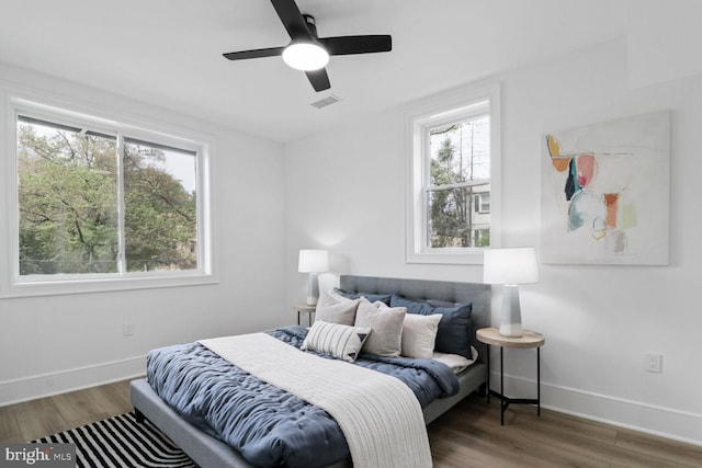 2524 41st St NW Unit 1, Washington, DC 20007 - bedroom with visible vents, wood finished floors, and multiple windows