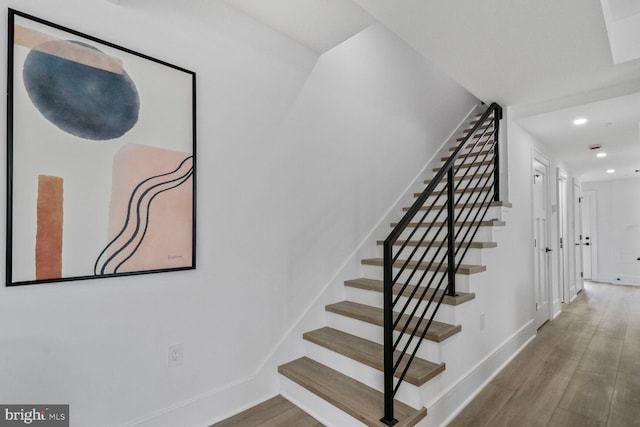 2524 41st St NW Unit 1, Washington, DC 20007 - stairs featuring recessed lighting, baseboards, and wood finished floors