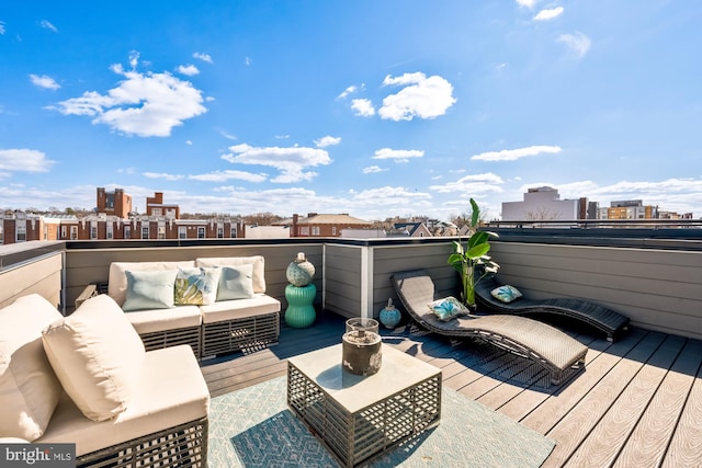 4016 Georgia Ave NW Unit 9, Washington, DC 20011 - wooden terrace featuring a city view and an outdoor living space