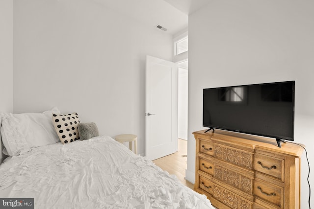 4016 Georgia Ave NW Unit 9, Washington, DC 20011 - bedroom with visible vents, baseboards, and wood finished floors