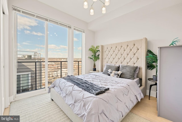 4016 Georgia Ave NW Unit 9, Washington, DC 20011 - bedroom featuring access to outside and wood finished floors