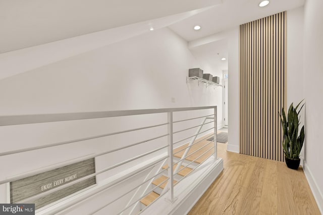 4016 Georgia Ave NW Unit 9, Washington, DC 20011 - hallway featuring recessed lighting, baseboards, an upstairs landing, and wood finished floors