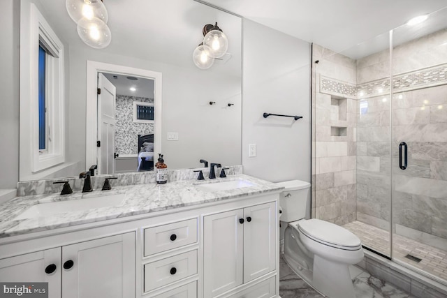 1317 Randolph St NW Unit 1, Washington, DC 20011 - bathroom featuring a sink, a shower stall, toilet, and marble finish floor