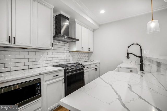 1317 Randolph St NW Unit 1, Washington, DC 20011 - kitchen featuring wall chimney range hood, decorative backsplash, gas stove, a sink, and stainless steel microwave
