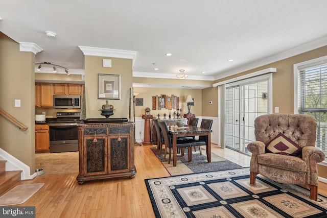 dining space with crown molding, stairs, baseboards, light wood-style floors, and recessed lighting